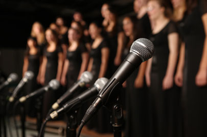 Practice learning how to become a backup singer by joining a Choir